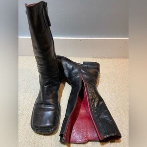 Genuine black leather calf height boots with red leather lining.  Made in Italy